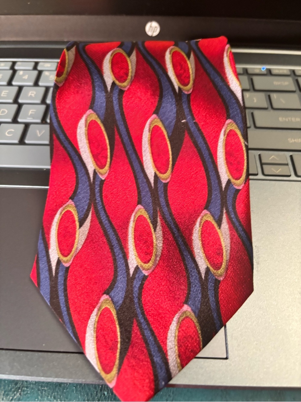 Men's Red Geometric Pattern Tie with Blue and Gold Accents